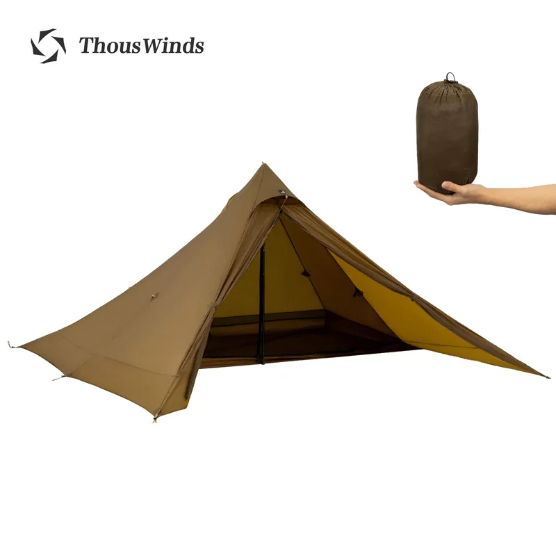 Ultralight trekking tent being pitched quickly in mountainous terrain